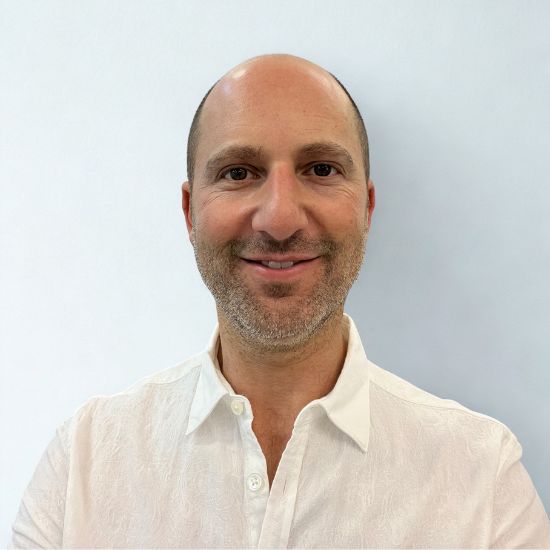 Headshot of Adam Goldstein